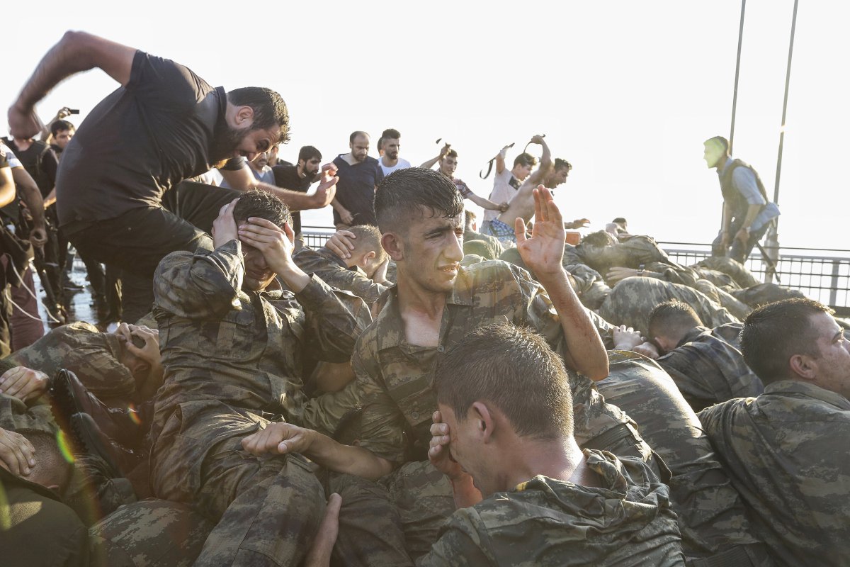 Soldiers involved in the coup attempt surrender on Bosphorus bridge in Istanbul, Turkey, on July 16, 2016.